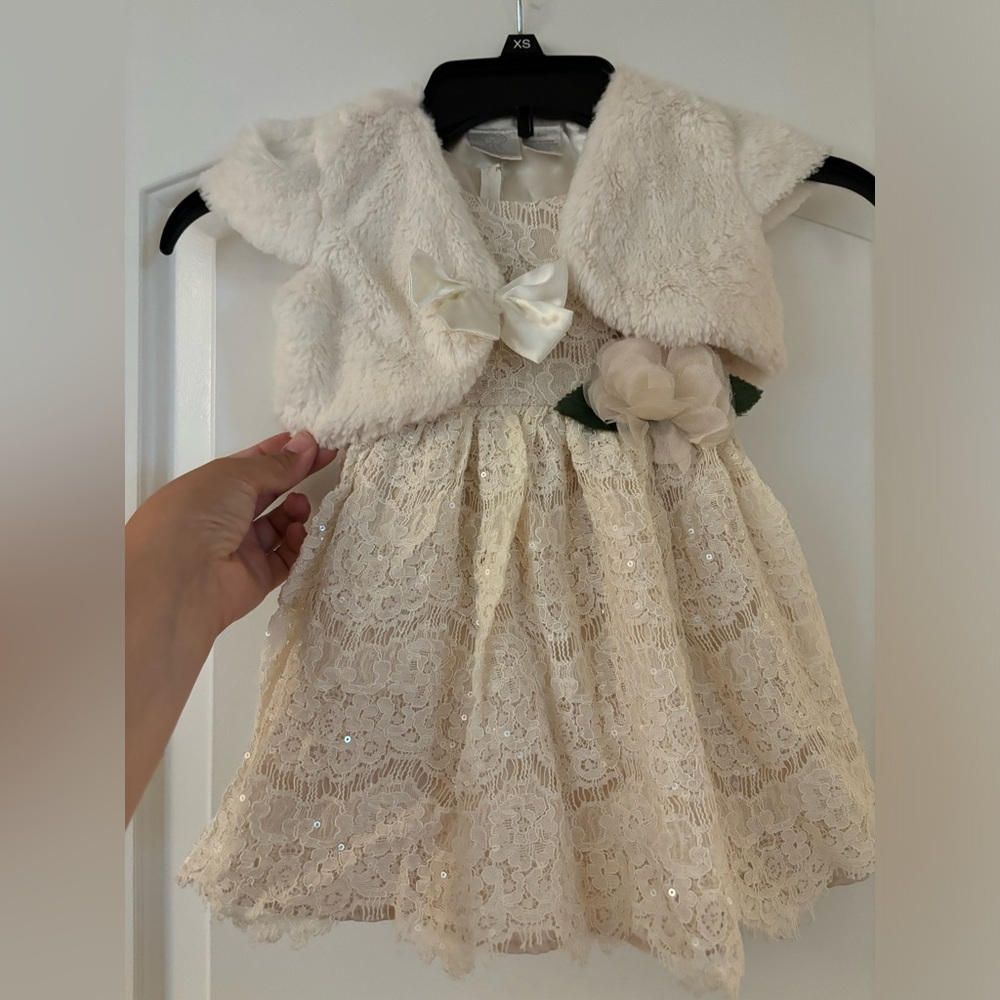 Sparkly champagne dress  with furry shoulder shawl.